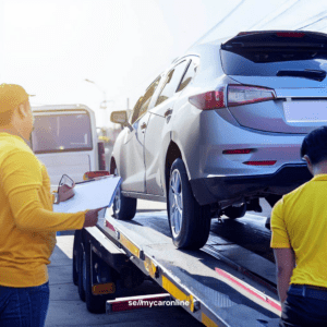 A car sold at auction being transported on a trailer
