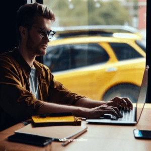 a man browsing on their computer to sell their vehicle